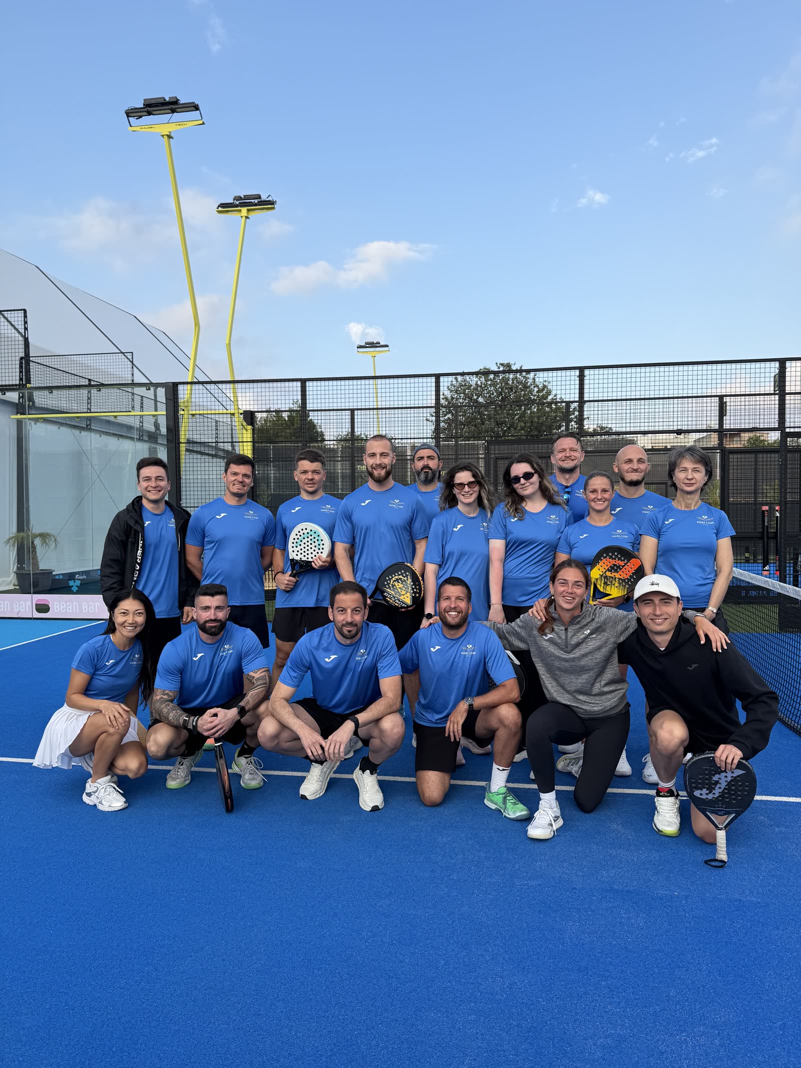 Large group of Padel Camp Cyprus participants and coaches on court