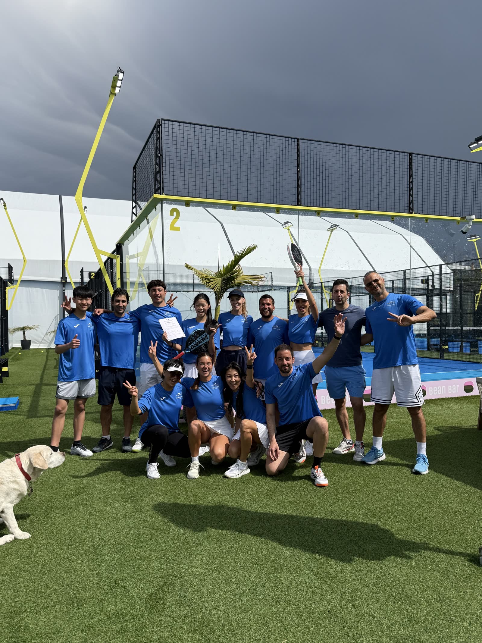 Padel Camp Cyprus participants and coaches celebrating together on court